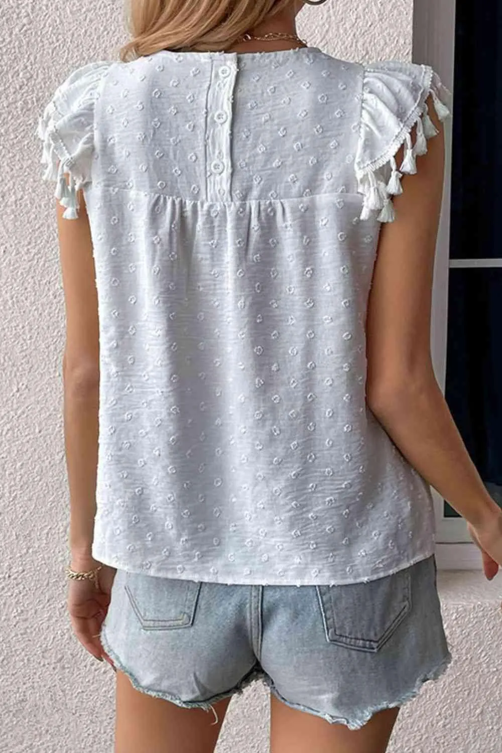 Calm Chic Swiss Dot Tassel Flutter Sleeve Blouse